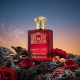 Red perfume bottle with gold accents on a dark surface with roses and smoke